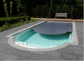 In-ground Roman Swimming Pool with Integrated Roldek Cover